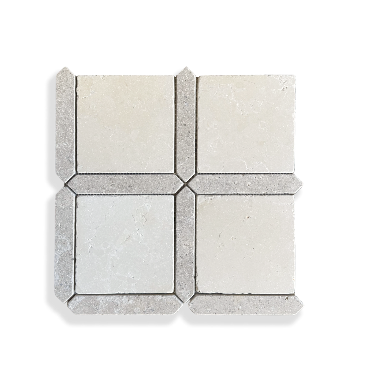 Palazzo Crema Serena and Calcare Naturale limestone mosaic edge detail