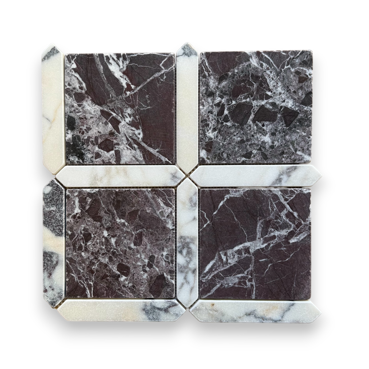 Palazzo Rosso Levanto and Calacatta Viola marble mosaic edge detail